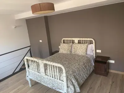 Cama o camas de una habitación en Dúplex Rural Casa Bergua