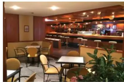 El salón o zona de bar de Acogedor apartamento a pie de pistas cota 1500