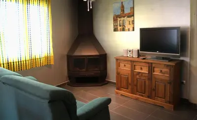 Una televisión o centro de entretenimiento en Arkupe Etxea