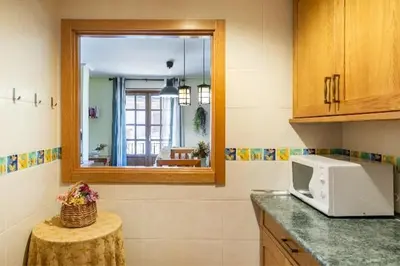 Una cocina o zona de cocina en Apartamentos Búbal Peña Telera