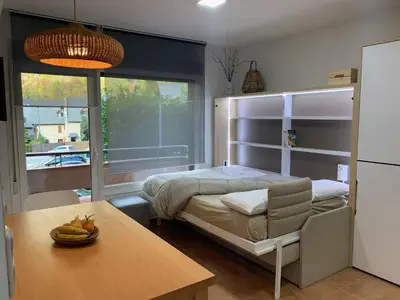 Cama o camas de una habitación en Apartament reformat i acollidor a Vielha, ben ubicat
