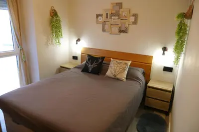 Cama o camas de una habitación en Greta, apartament cèntric i amb encant
