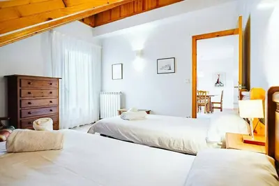 Cama o camas de una habitación en Olympia by Cardi Suites.