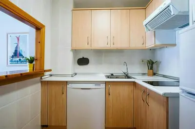 Una cocina o zona de cocina en Olympia by Cardi Suites.