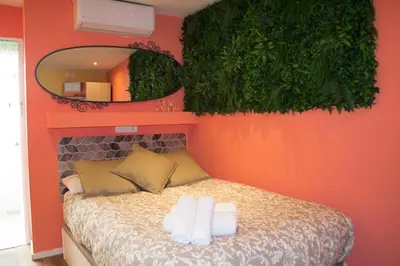 Cama o camas de una habitación en Apartamenticos San Pablo I