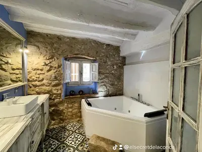 Un baño de El Secret de la LLegenda El Drac