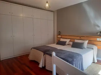 Cama o camas de una habitación en Acogedor y cálido apartamento con vistas a la montaña