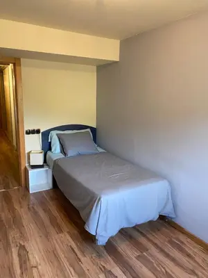Cama o camas de una habitación en Habitatge d'ús turístic Lo Cresol