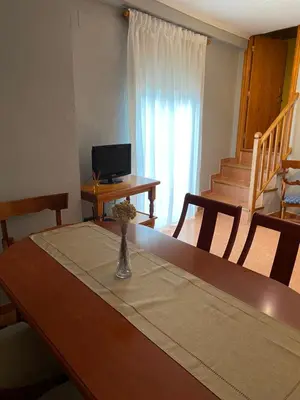Una televisión o centro de entretenimiento en Habitatge d'ús turístic Lo Cresol
