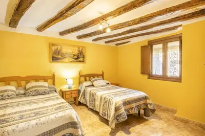 Cama o camas de una habitación en Casa Rural Teulé