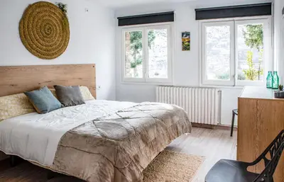 Cama o camas de una habitación en Casa Joana - Apartamento La Colomina- se admiten mascotas