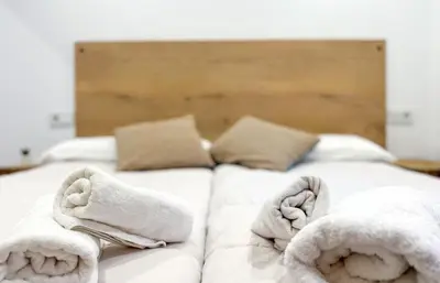 Cama o camas de una habitación en Casa Joana - Apartamento La Colomina- se admiten mascotas