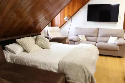Zona de estar de Casa Honoria amplio, con vistas y parking - Arafita Apartamentos