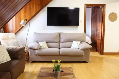 Zona de estar de Casa Honoria amplio, con vistas y parking - Arafita Apartamentos