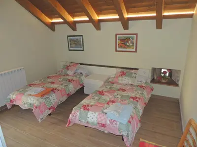 Cama o camas de una habitación en Casa Rural Sardas 60m2 con GARAGE - Sabiñanigo