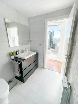 Un baño de Ático mejores vistas al Pilar jacuzzi y garaje