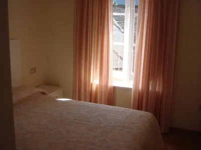 Cama o camas de una habitación en Apartamentos Valles