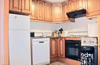 Una cocina o zona de cocina en CHECK-IN CASAS Luana