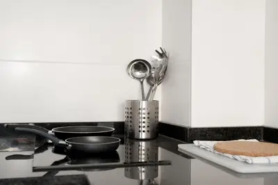 Una cocina o zona de cocina en Apartamentos Sabinas Don Jaime
