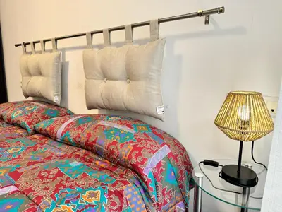 Cama o camas de una habitación en APARTAMENTO ROMELIA 1ºa