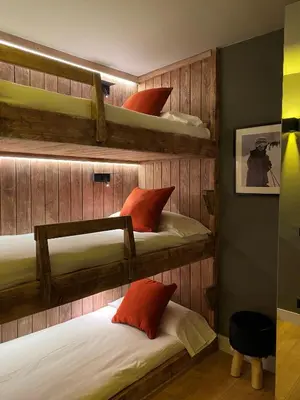 Cama o camas de una habitación en Baqueira321 Ubicación Privilegiada.