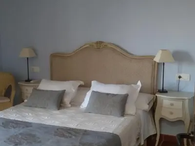 Cama o camas de una habitación en Casa Rural El Gaiter
