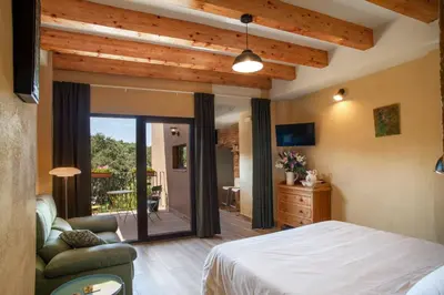Cama o camas de una habitación en Priorat Aparthotel