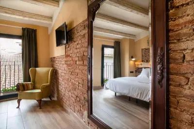 Cama o camas de una habitación en Priorat Aparthotel