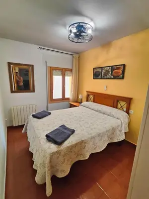 Cama o camas de una habitación en CASA RURAL EL CAIDERÓN