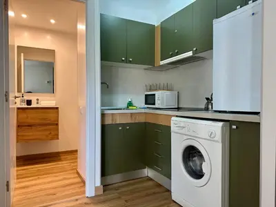 Una cocina o zona de cocina en Izas · Pirineos360 · Práctico y sencillo · Perfecto para esquiadores