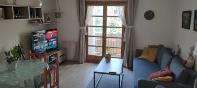 Una televisión o centro de entretenimiento en Apartamento en Benasque