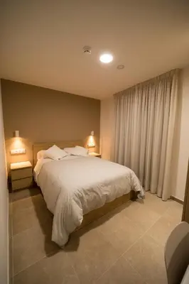 Cama o camas de una habitación en Hostal Martínez