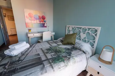 Cama o camas de una habitación en Arista Huesca