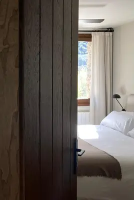 Cama o camas de una habitación en Les Nous Hotel