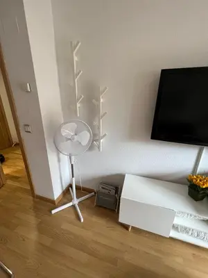 Una televisión o centro de entretenimiento en Apartamento en Sabiñánigo con amplia y soleada terraza