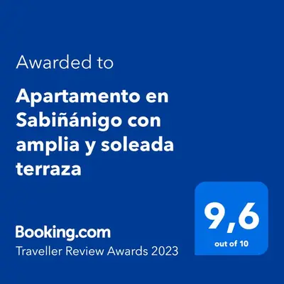 Certificado, premio, señal o documento que está expuesto en Apartamento en Sabiñánigo con amplia y soleada terraza