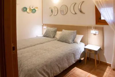 Cama o camas de una habitación en Apartamentos Erlueta