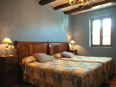 Cama o camas de una habitación en Apartamentos Rurales Kastonea