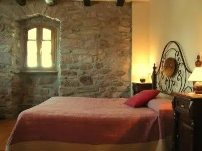 Cama o camas de una habitación en Apartamentos Rurales Kastonea