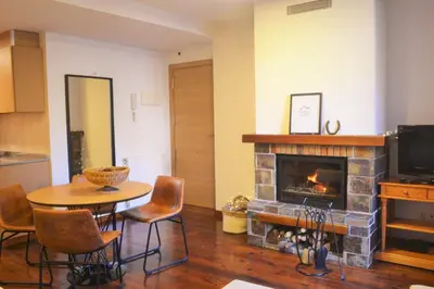 Plano de Apartament acollidor amb una gran llar de foc by RURAL D'ÀNEU