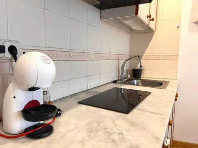 Una cocina o zona de cocina en Apartamento Céntrico con Parking - L'Amfitriona