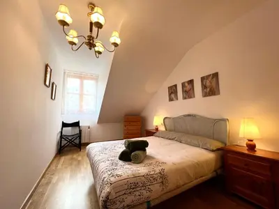 Cama o camas de una habitación en Apartamento Céntrico con Parking - L'Amfitriona