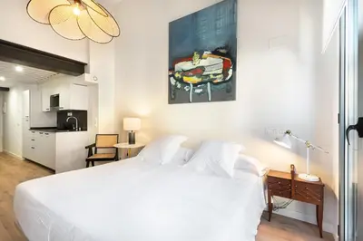Cama o camas de una habitación en Okako Apartments Tudela