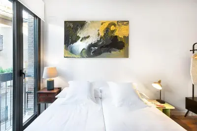 Cama o camas de una habitación en Okako Apartments Tudela