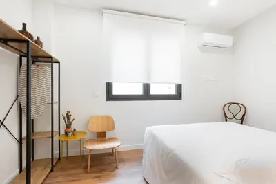 Cama o camas de una habitación en Okako Apartments Tudela