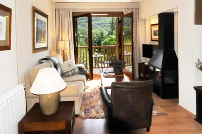 Zona de estar de Chardín de Llis-Apartamentos Chardins