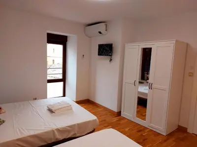 Cama o camas de una habitación en B&B Apartamentos La Atalaya