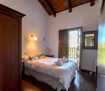 Cama o camas de una habitación en Sol Badaguas Jaca