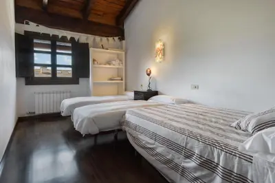 Cama o camas de una habitación en Sol Badaguas Jaca