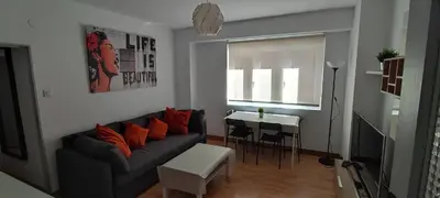Zona de estar de Apartamento en zona céntrica y tranquila.
